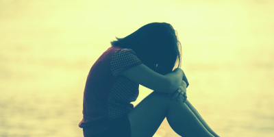 anxiety - woman with bowed head - having peace when we feel anxious or fearful @joylenton.com