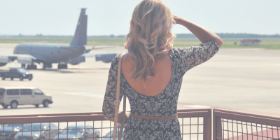 holding - uncertainty - woman scanning sky for planes - @joylenton.com